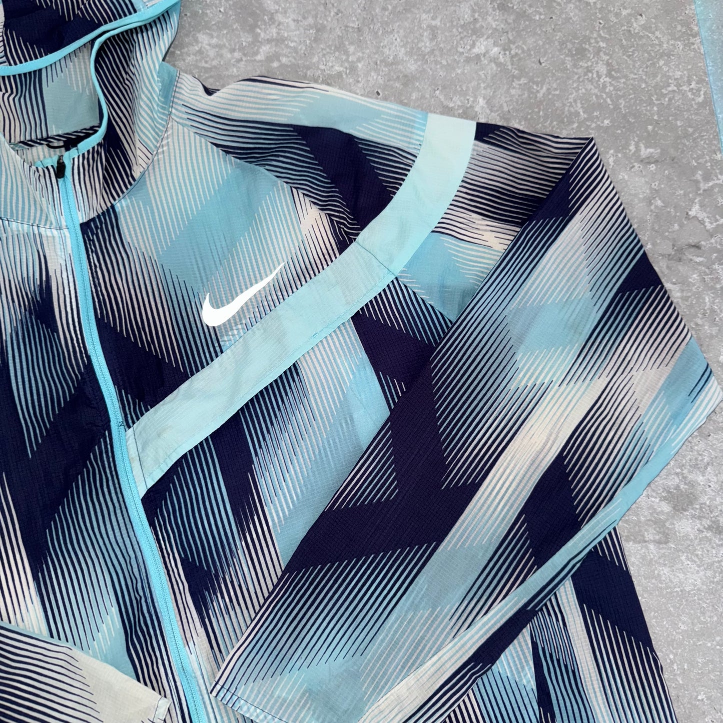 Nike Impossibly Light Blue Windbreaker