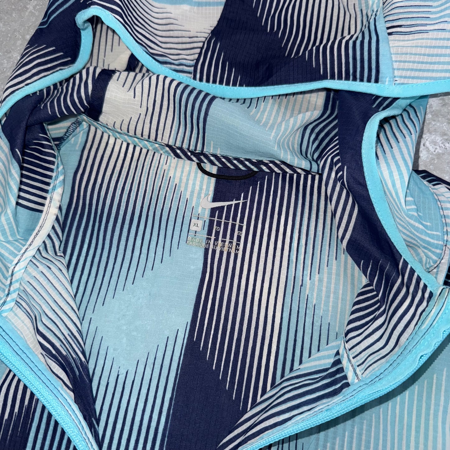 Nike Impossibly Light Blue Windbreaker