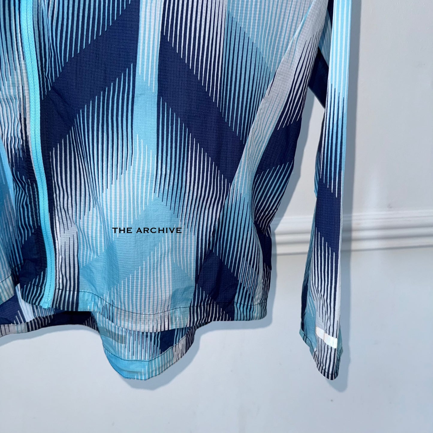 Nike Impossibly Light Blue Windbreaker