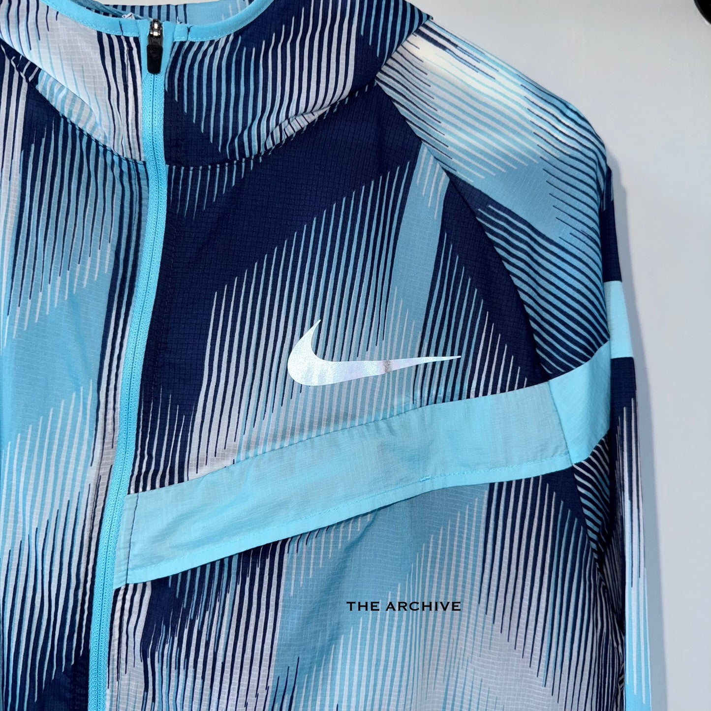Nike Impossibly Light Blue Windbreaker