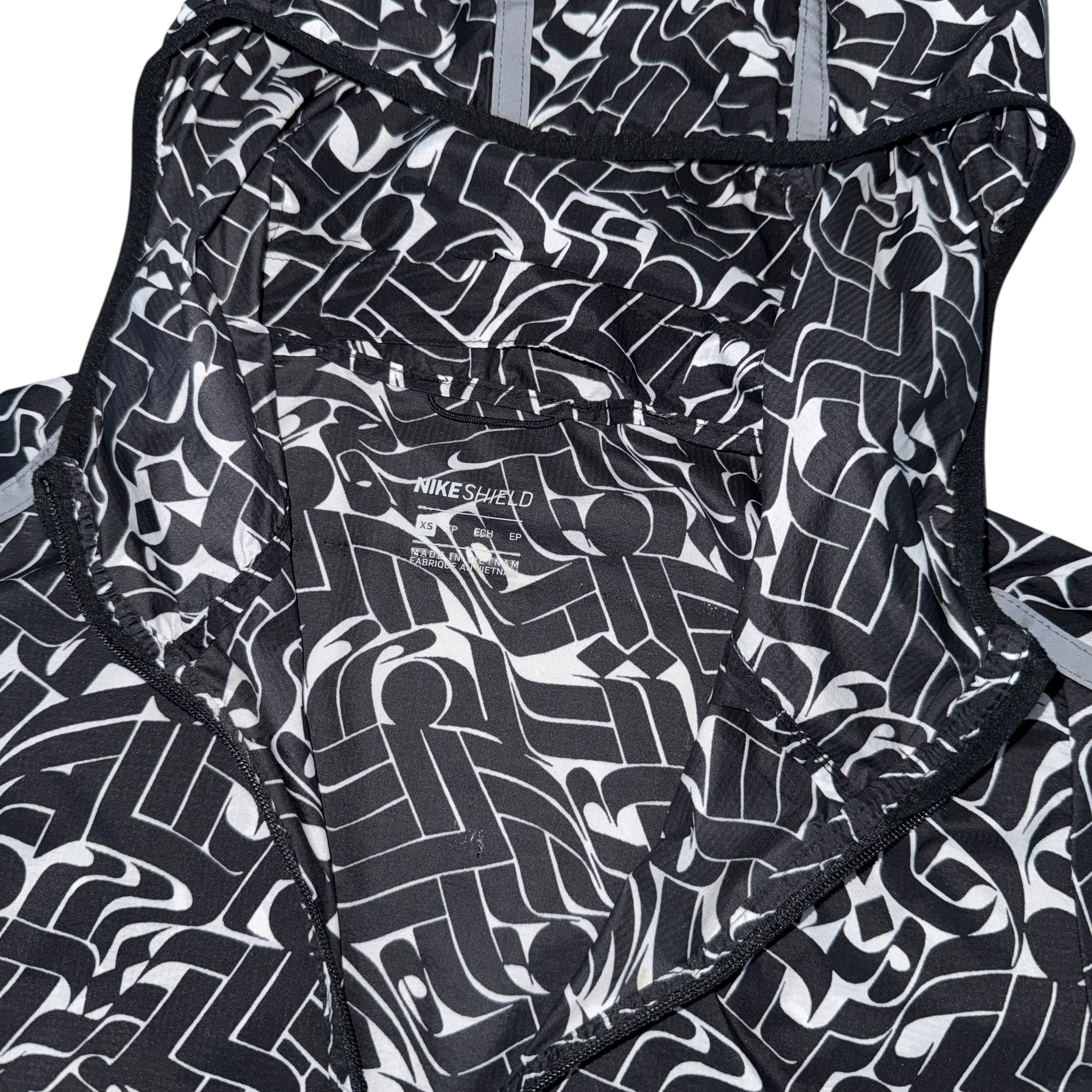 Nike Impossibly Light Black Pattern Windbreaker