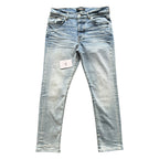 Amiri Light Blue Distressed Jeans