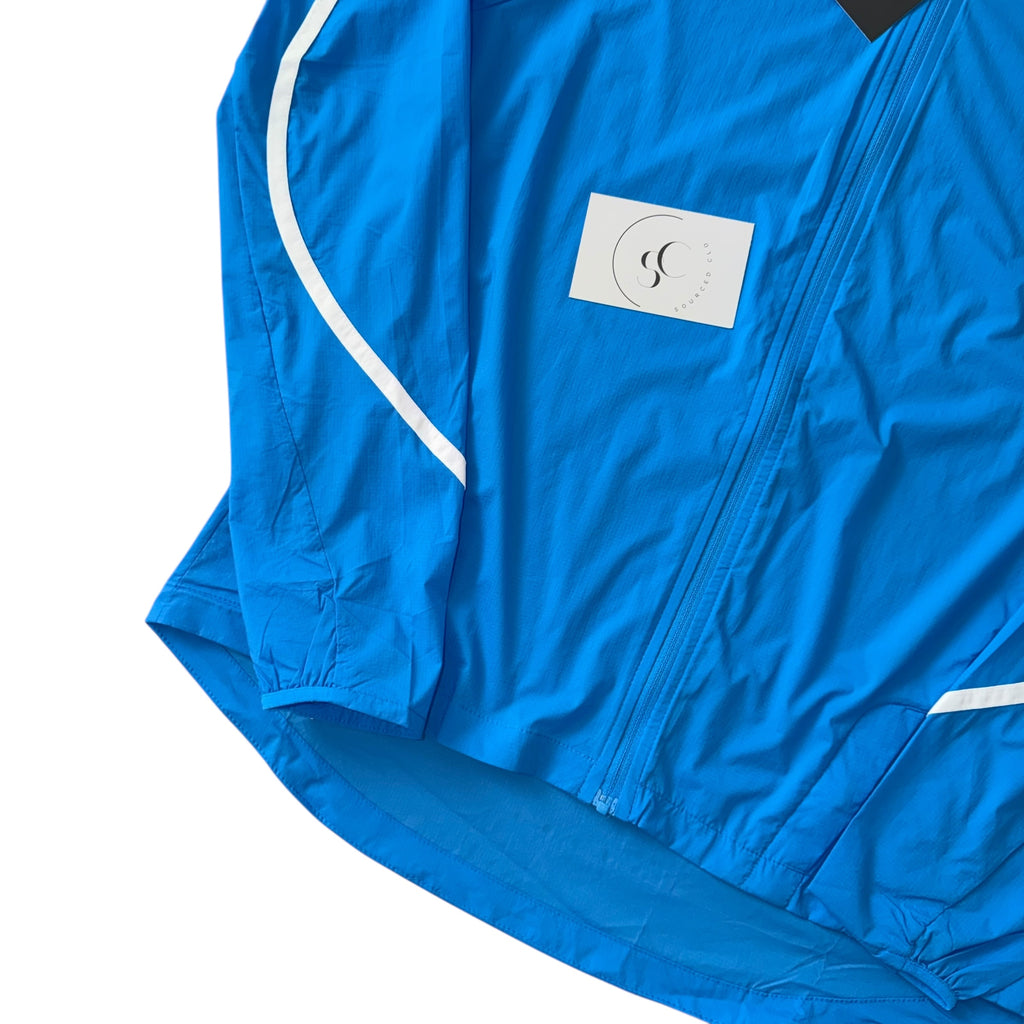 Nike Women’s Blue Impossibly Light Windrunner