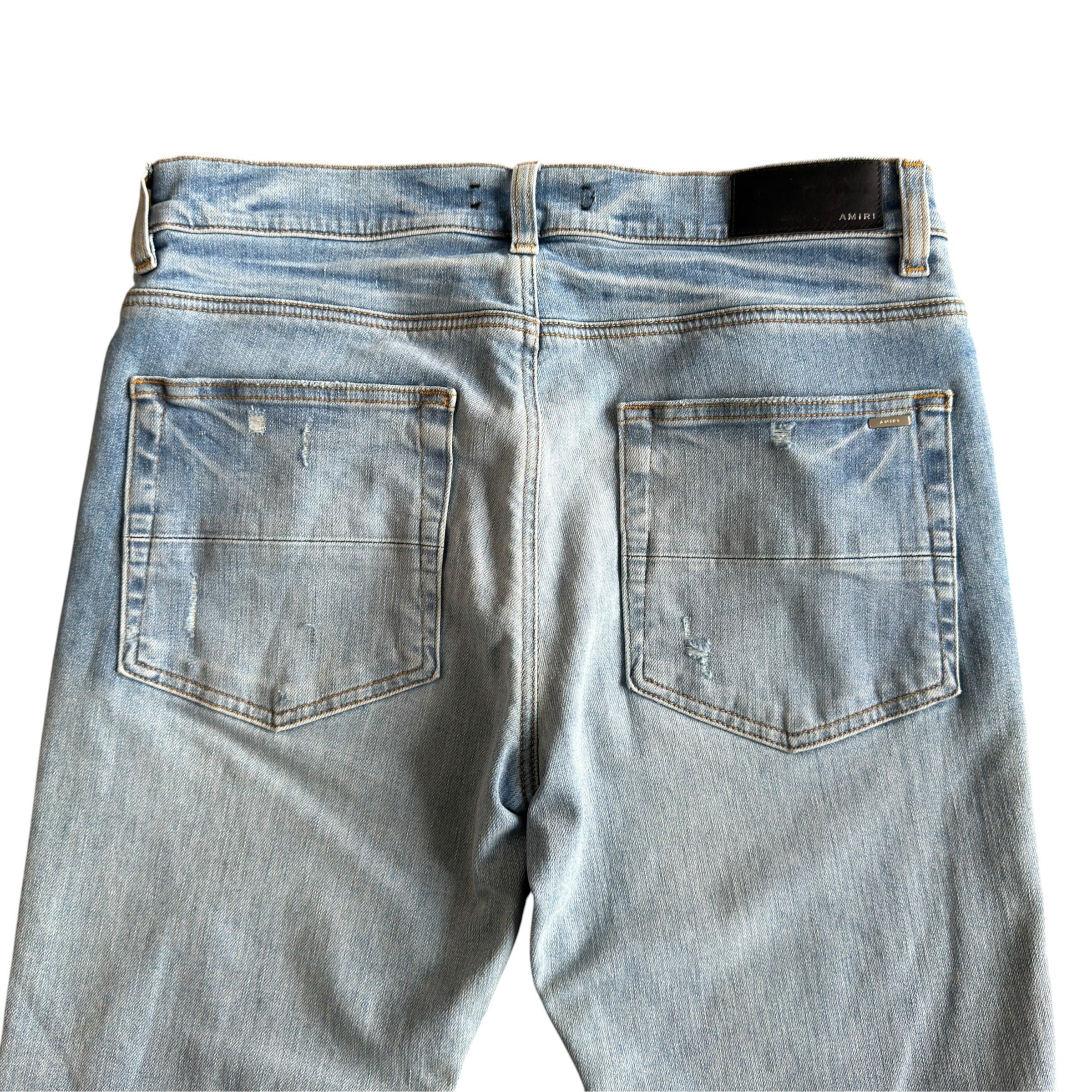 Amiri Light Blue Distressed Jeans